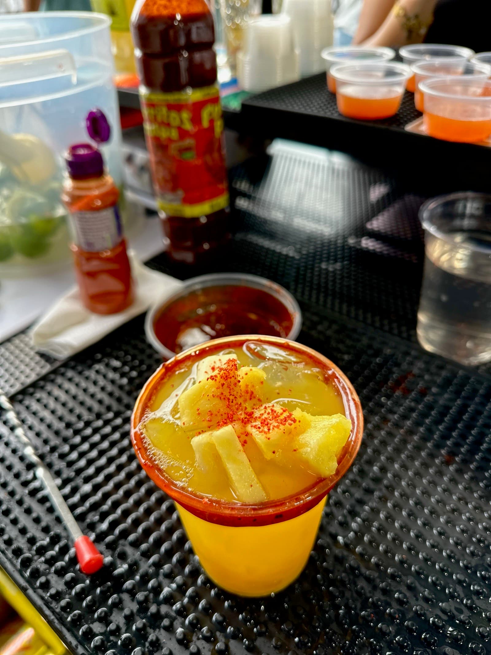 Aguas frescas line at a Rimdrip outdoor event